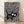 Minimalist line art poster featuring a black cat surrounded by an abstract pattern of red and white eyes, creating a quirky and slightly unsettling whimsical design.