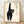 Whimsical black cat framed poster in vintage Japanese woodblock print style with cream and white accents, featuring charming folk-art aesthetic.