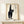 Vintage Japanese-style black cat wall print featuring traditional woodblock aesthetics with cream and black coloring, evoking folk-inspired character.