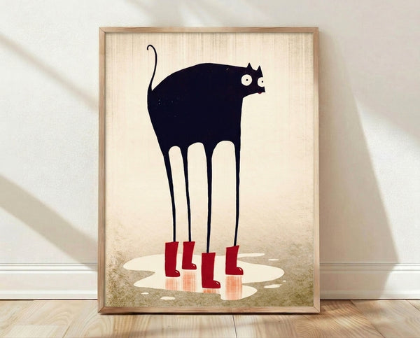 Whimsical line art print of a black cat wearing bright red rain boots, standing in a puddle with a playful expression against a cream and taupe background.