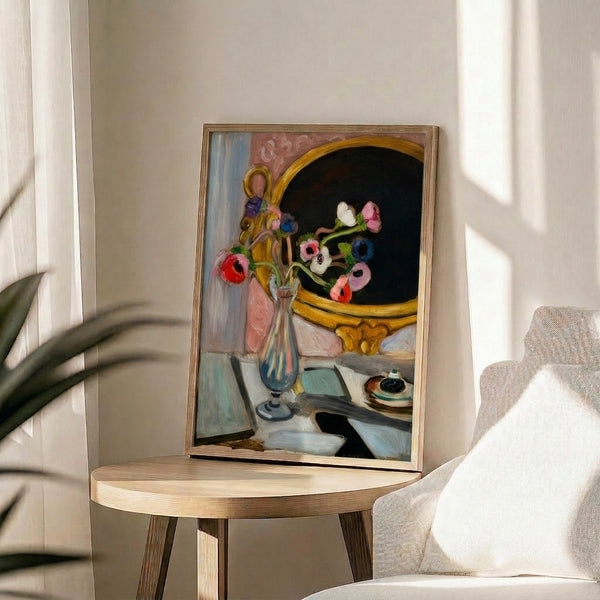 Modernist botanical print showing anemone flowers in vivid blue and cream tones, arranged in a vessel with bold outlines and minimalist aesthetic.