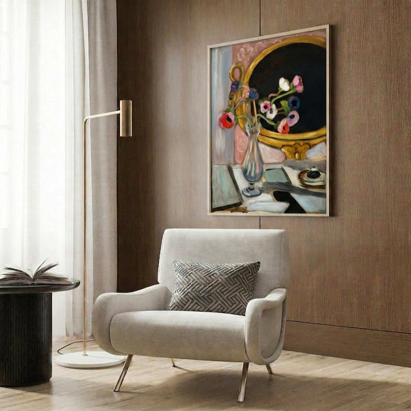 Poster art of striking black-outlined anemones in blue and white hues arranged in a vase, exemplifying avant-garde floral painting on a gallery wall.