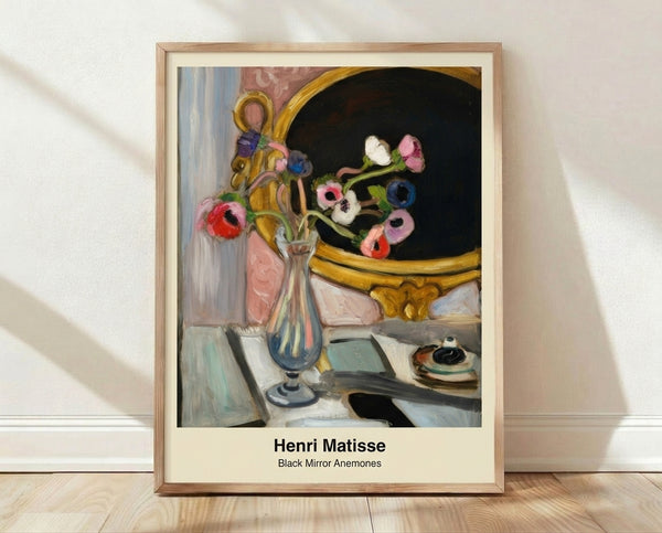 Framed poster of Black Mirror Anemones featuring a vibrant bouquet of coral and white blooms in a deep blue vase, rendered in expressive Impressionist style with bold black accents and lush green foliage.