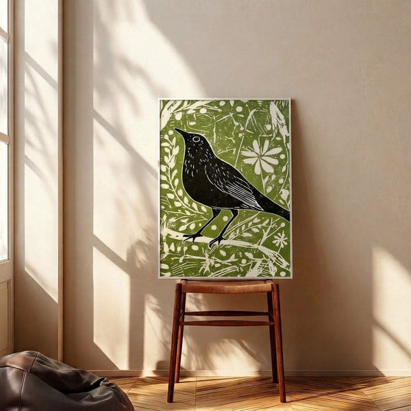 Vintage-style line art poster of a blackbird nestled in olive foliage rendered in black ink on cream, embodying folk-inspired botanical aesthetic and serene countryside charm.