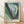 Abstract art print in soft cream, blue, and green tones featuring flowing organic petals and forms that evoke both botanical and musical sensibility in a contemplative modern style.