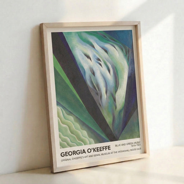 Modern abstract print showcasing layered petals in green and blue with charcoal accents, rendered in a flowing style that merges botanical and ethereal qualities.