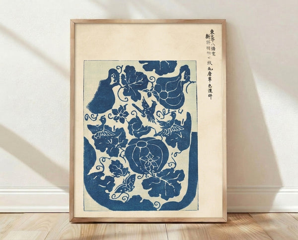 Serene Japanese woodblock print featuring birds, flowers, and gourds in prussian blue and cream tones, displayed as a framed poster with ornamental scroll design.
