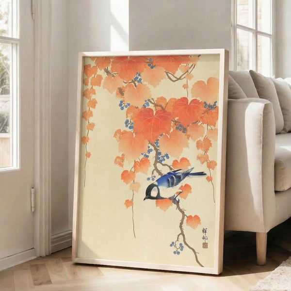 Traditional Japanese woodblock-style wall art showing a solitary bird on a vine-laden branch with autumnal leaves in cream and gold.