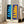 Bold abstract wall art with organic blue forms against a cream background, inspired by modernist cut-out techniques.