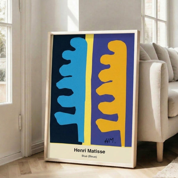 Bold abstract wall art with organic blue forms against a cream background, inspired by modernist cut-out techniques.