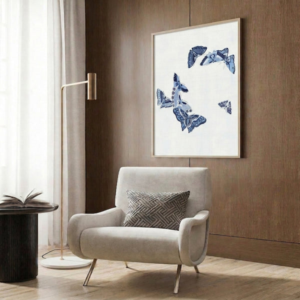 Japandi-inspired framed poster of a graceful butterfly in navy blue line art, creating an elegant and peaceful focal point.