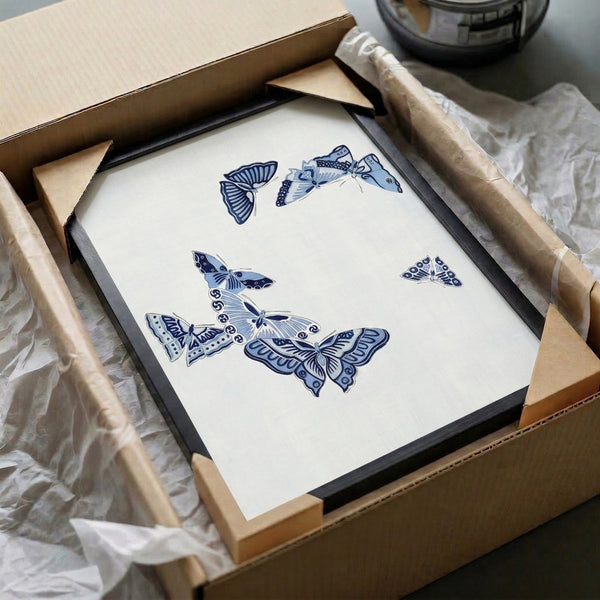 Simple yet refined butterfly illustration in indigo shades on light cream, a contemplative minimalist wall print in japandi style.