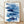 Framed watercolor poster featuring a serene school of fish in navy and light blue tones with delicate line art details on a cream background.