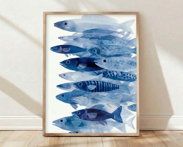 Framed watercolor poster featuring a serene school of fish in navy and light blue tones with delicate line art details on a cream background.
