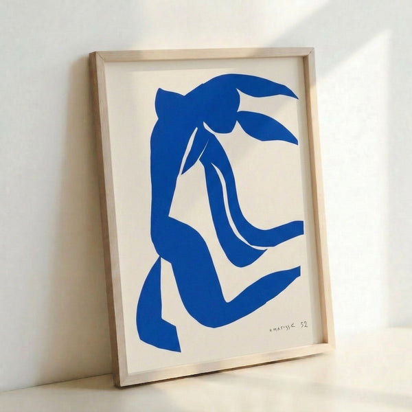 Framed poster displaying an abstract figure with luminous blue hair and gentle facial features in a minimalist, contemplative composition.