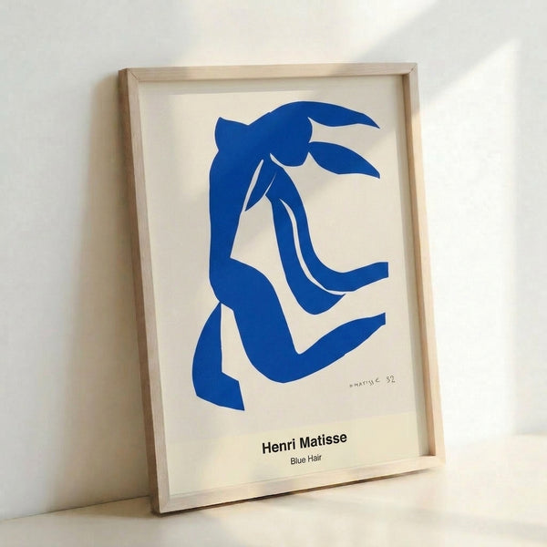 Bold abstract face with vivid blue hair and simplified features in warm ochre and neutral tones, embodying minimalist and expressive artistic sensibility.