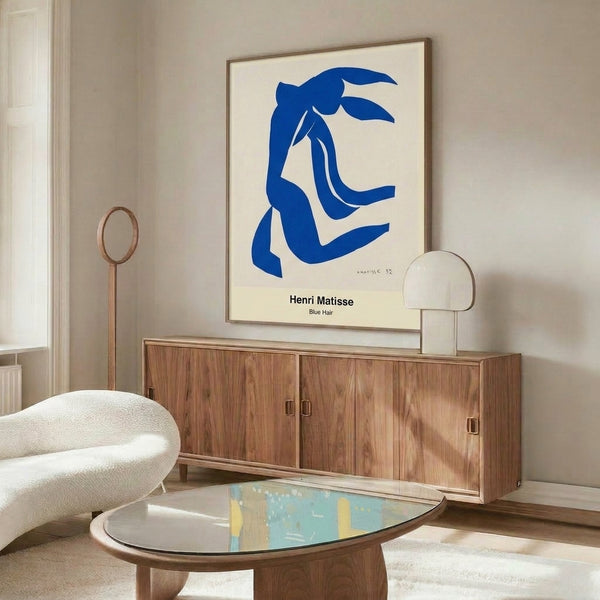Modern art print featuring an abstract portrait with striking blue hair, soft flesh tones, and ochre details in a bold yet restrained composition.