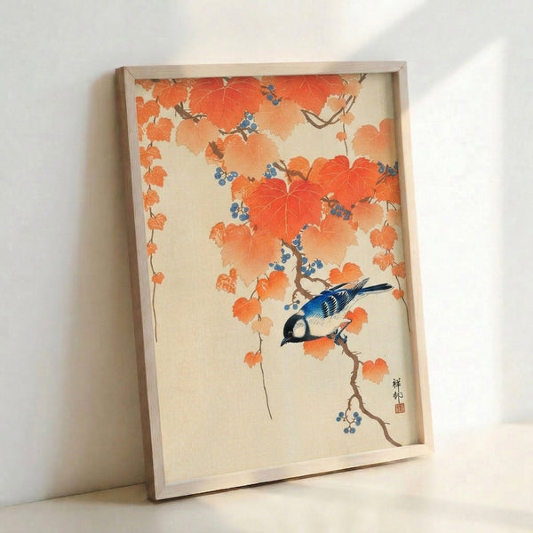 Framed poster showing a peaceful bird nestled within branching autumn vines, combining cobalt blue plumage with cream and brown natural elements in classical Japanese style.