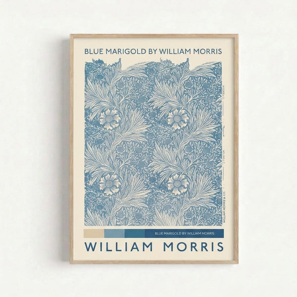 Vintage William Morris-inspired floral print showcasing elegant marigold blooms in blue tones with decorative foliage and natural calming aesthetic.
