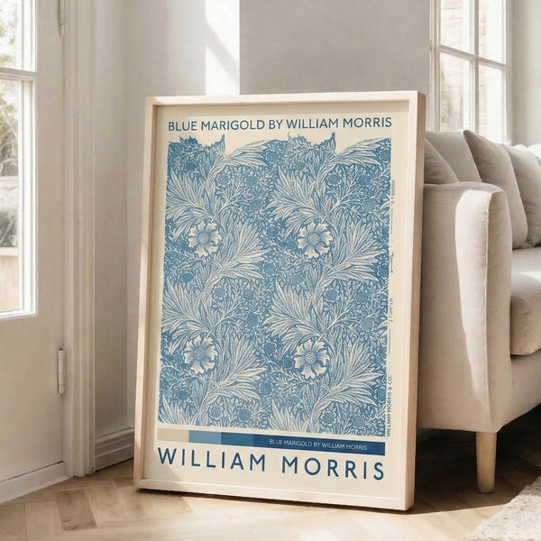 Elegant floral wall print in Art Nouveau style featuring marigolds rendered in teal, navy, and cream with naturalistic leafy ornamentation.