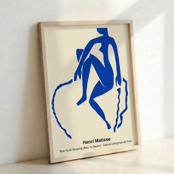 Matisse-inspired blue abstracted figure captured mid-skip, white space and warm tones creating playful minimalist composition.