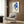 Elegant abstract nude in flowing blue tones with warm accent details, minimalist cutout design capturing movement and joy.