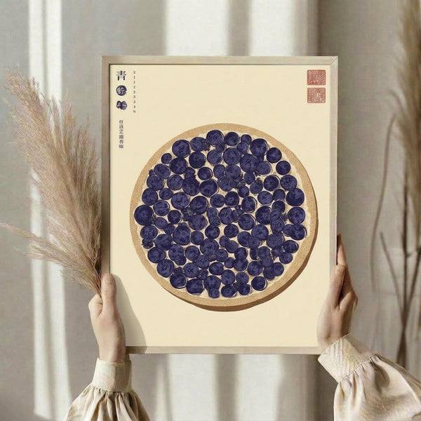 Vintage East Asian woodblock-style print of blueberries on cream paper with navy and ochre accents, displaying calm botanical composition and traditional decorative seals in a frame.