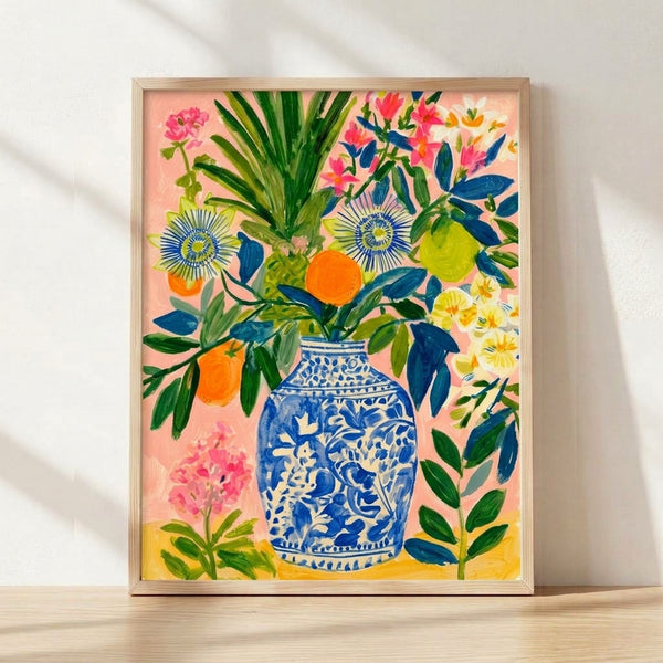 Framed poster displaying a modern Japandi-style vase filled with vibrant citrus fruits and passion flowers in soft pink, cobalt blue, and coral orange against a cream background.