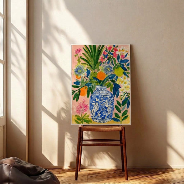 Contemporary botanical poster showing an elegant vase with joyful citrus blooms and green leaves in a soft palette of cobalt, coral, and cream tones.