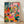 Mid-century modern botanical poster featuring a woman among potted plants and flowers on shelves, rendered in vibrant coral pink, emerald green, and golden yellow tones with a Bauhaus aesthetic.