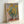 Golden sunflowers arranged in a vase, rendered in classic impressionist technique with rich warm colors and soft brushwork.