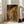 Impressionist bust portrait of a woman in soft ochre and cream tones, rendered in classical style with intimate, contemplative mood; framed art print on wall.
