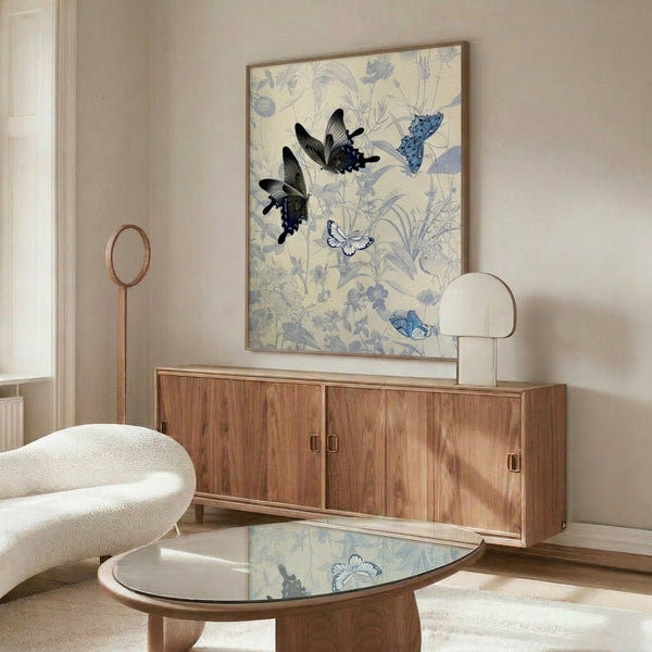 Soft watercolor garden scene with blue butterflies and flowering plants in cream, pale blue, and lavender, framed as minimalist botanical wall art.