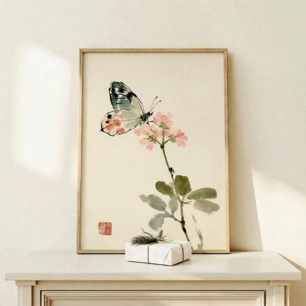 Contemplative Asian-inspired artwork featuring a butterfly on pink flowers rendered in soft watercolor washes and black ink brushwork, displayed as a framed print.