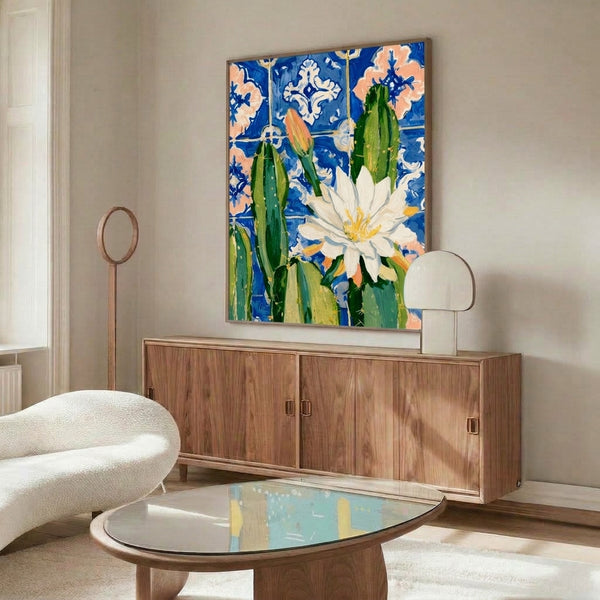 Framed botanical poster with eclectic boho design showing a cactus flower in coral and forest green hues on a cream and blue tile background, watercolor technique.