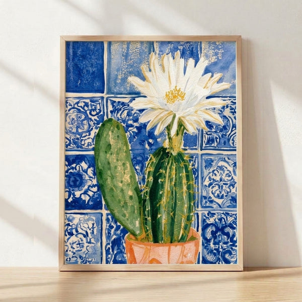 Watercolor painting of a blooming cactus in a terracotta pot adorned with cobalt blue and golden yellow Talavera tile patterns, rendered in soft washes against cream and white, creating a cheerful boho botanical aesthetic.