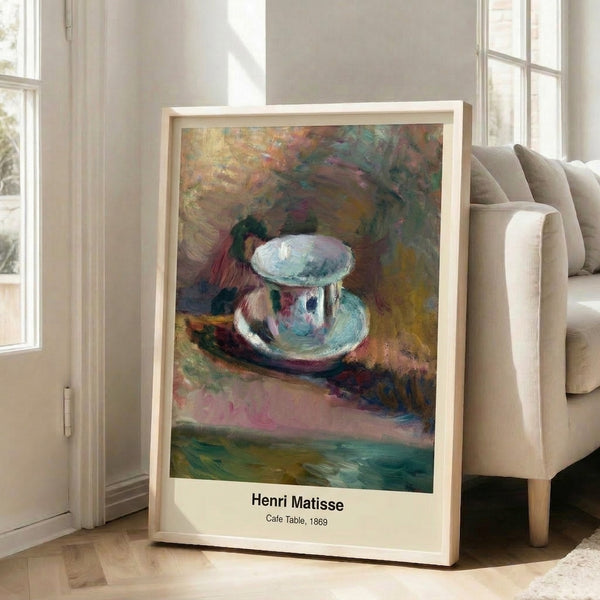 Minimalist framed print of a cafe table in warm earth tones—ochre, burnt sienna, and cream—with sophisticated Art Nouveau styling and contemplative atmosphere.