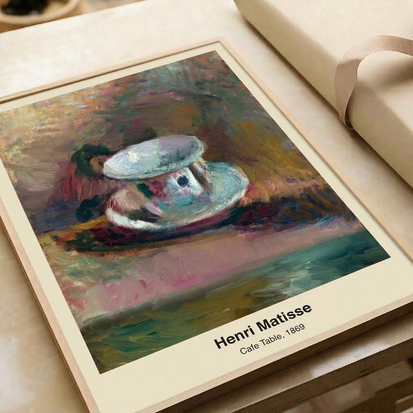 Framed artwork presenting a stylized cafe table in muted burnt sienna, cream, and ochre tones with minimalist modern aesthetic and contemplative warmth.