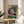 Serene cafe table scene in contemporary art style with reduced color palette of creams, warm browns, and soft blues, creating tranquil wall decor.