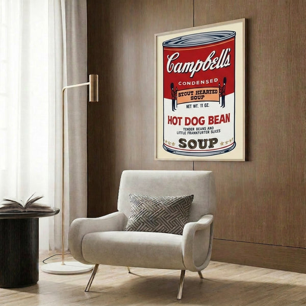 Framed wall art print of Warhol's reimagined Campbell's soup can, a foundational pop art work in bold red, white, and black.