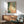 Modern zen wall art combining muted greens, warm coral, and gold elements in an organic abstract composition for peaceful interior spaces.