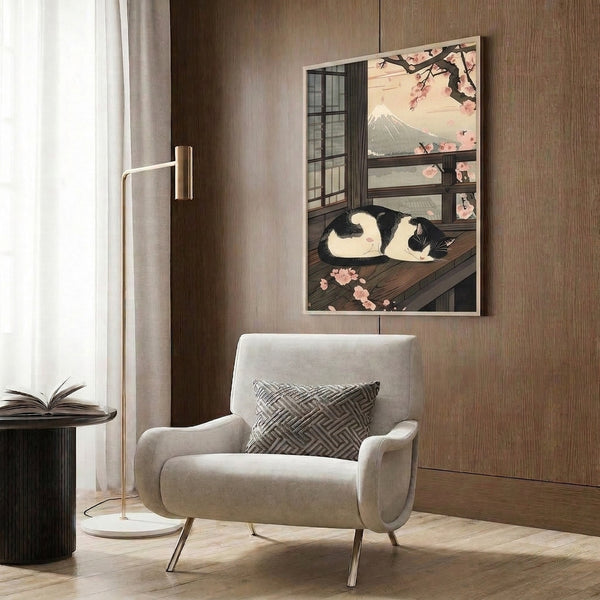 Japandi framed wall art in muted colors featuring a contemplative tuxedo cat with blooming sakura and a distant sacred mountain landscape.