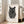 Modern line art print showing a mysterious cat profile fused with fingerprint imagery in black and white, minimalist style.