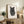 Minimalist framed wall art depicting a cat and fingerprint design in clean black lines on light background, contemporary aesthetic.