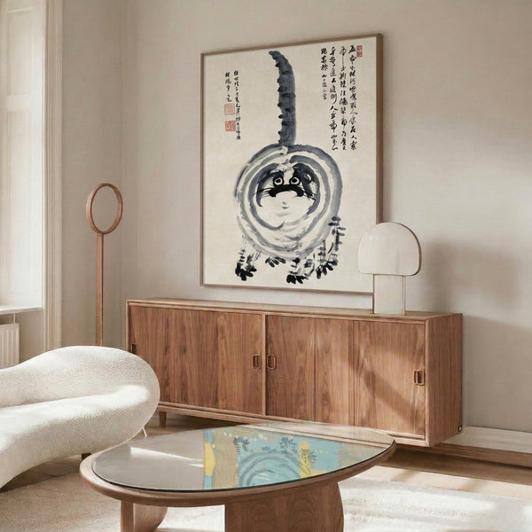 Framed poster depicting a meditative ink-painted cat with gourd and calligraphic elements in subdued black and gray tones on cream ground.