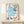Minimalist wall art showing a figure enjoying quiet time with an orange cat, cups, and poetry books in a contemplative Japandi composition.
