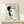 Folk art inspired black cat print with figure in minimalist line art style, echoing Showa era Japanese poster design and playful character.