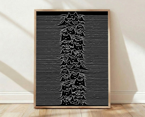 Minimalist black and white framed poster featuring an abstract cat silhouette merged with rolling waves and mountain peaks, creating a whimsical yet meditative contemporary design.