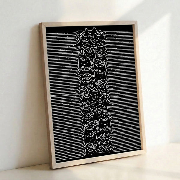 Framed abstract poster with a playful black cat figure intertwined with geometric wave and peak patterns in a minimalist monochrome composition.