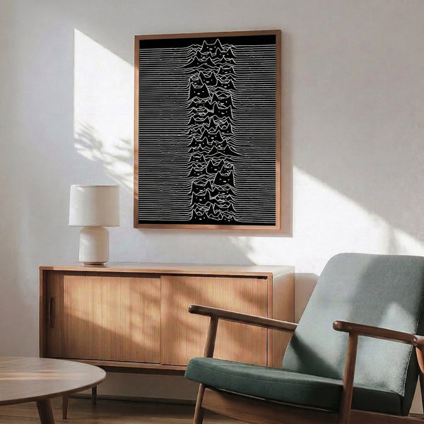 Black and white modern poster featuring an imaginative cat profile seamlessly integrated with rolling waves and mountain contours in an abstract style.